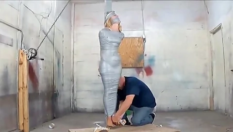 Blonde Taped To A Pole