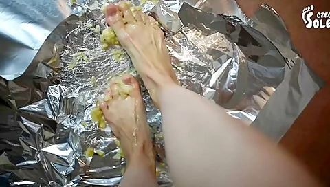 Long Legged Woman Mashing Bananas With Her Huge European Feet