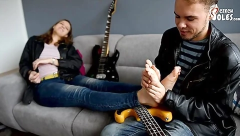 Charming Brunette Seduces A Horny Guitar Boy With Her Attractive Feet