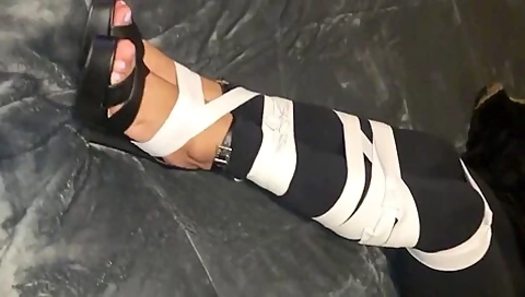 Legs Tied Up In High Heels