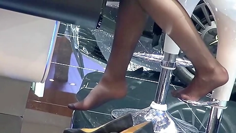 Stockinged Feet In Barber Chair