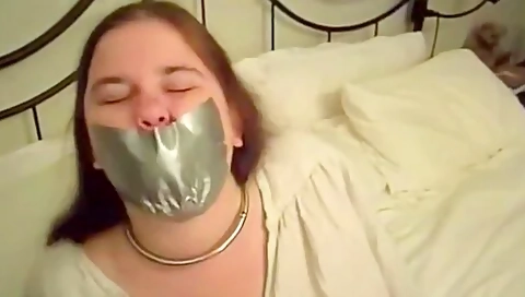 Struggling To Get The Tape Gag Off