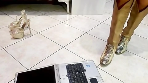 Naughty Girls Crushing Laptops Keyboard With Their Kinky Shoes