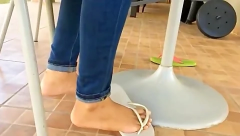 Two Wild Babes Wearing Flip Flops And Playing With Their Attractive Feet