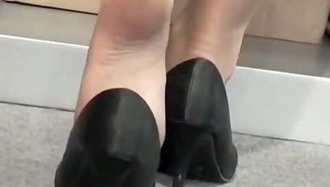 Hot Blonde Likes Playing With Her Lovely Feet And Shoes At The Office