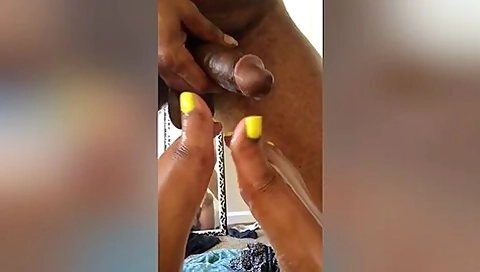Sexy Black Feet With Yellow Nail Polish Stroking A Massive Cock Until It