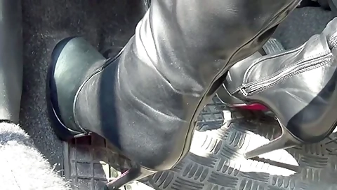 Smoking Hot Girl In Provocative Black Boots Does Some Pedal Pumping In The Sport Car