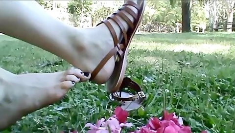 Christine Rubs Pink Petals With Her Sandals