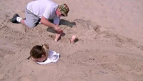 Buried To Sand And Tickled