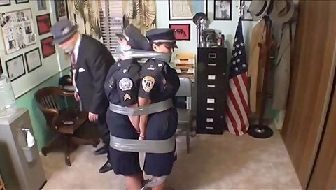 Two Cops Cuffed And Duct Taped