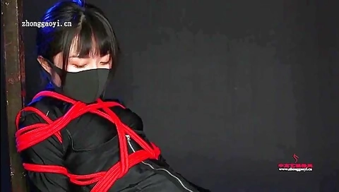 Ninja Girl Tied In Red Ropes