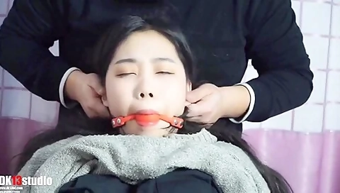 Cute Asian Bound In Gray Sweater