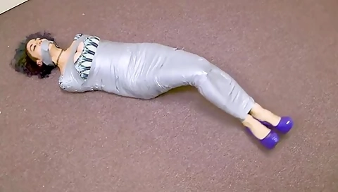 Girl Wrapped Up In Silver Tape