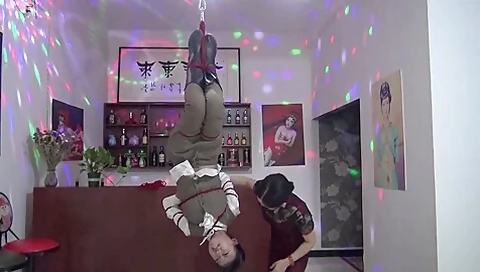 Asian Girl Tied Upside Down