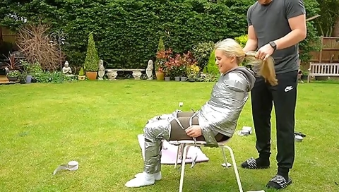 Blonde Duct Taped To Chair