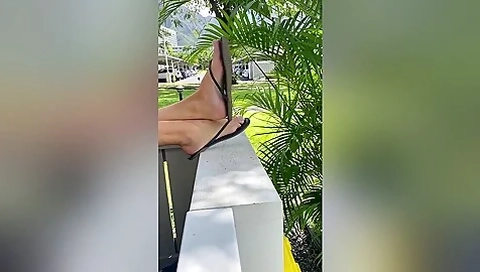 Amateur Girlfriend With Feet Dangling Her Flip-flops Outdoo With Super Sexy