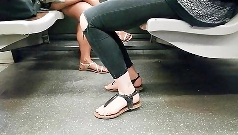 Blonde & Asian Feet On The Metro (faceshot)