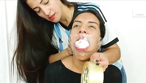 Sexy Girl Gagged With Ten Socks By Hot Latina Milf