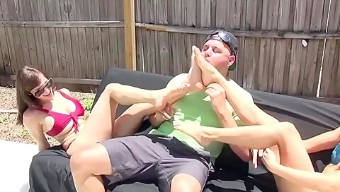 Two Exotic Bikini Dolls Got Their Feet Worshiped Outdoors By A Pool Guy