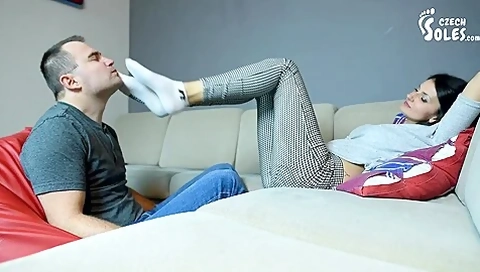Slender Brunette Gets Her Feet In White Socks Worshiped And Sniffed By
