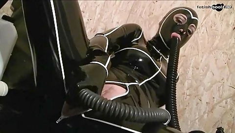 Gas Mask And Latex Catsuit